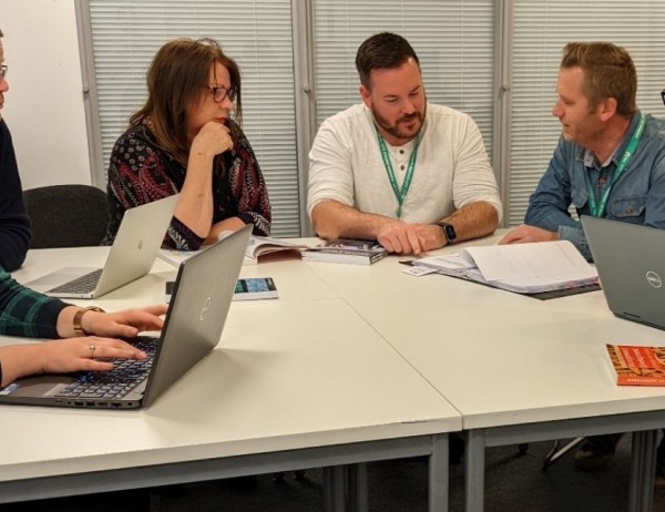 HE students in a group discussion