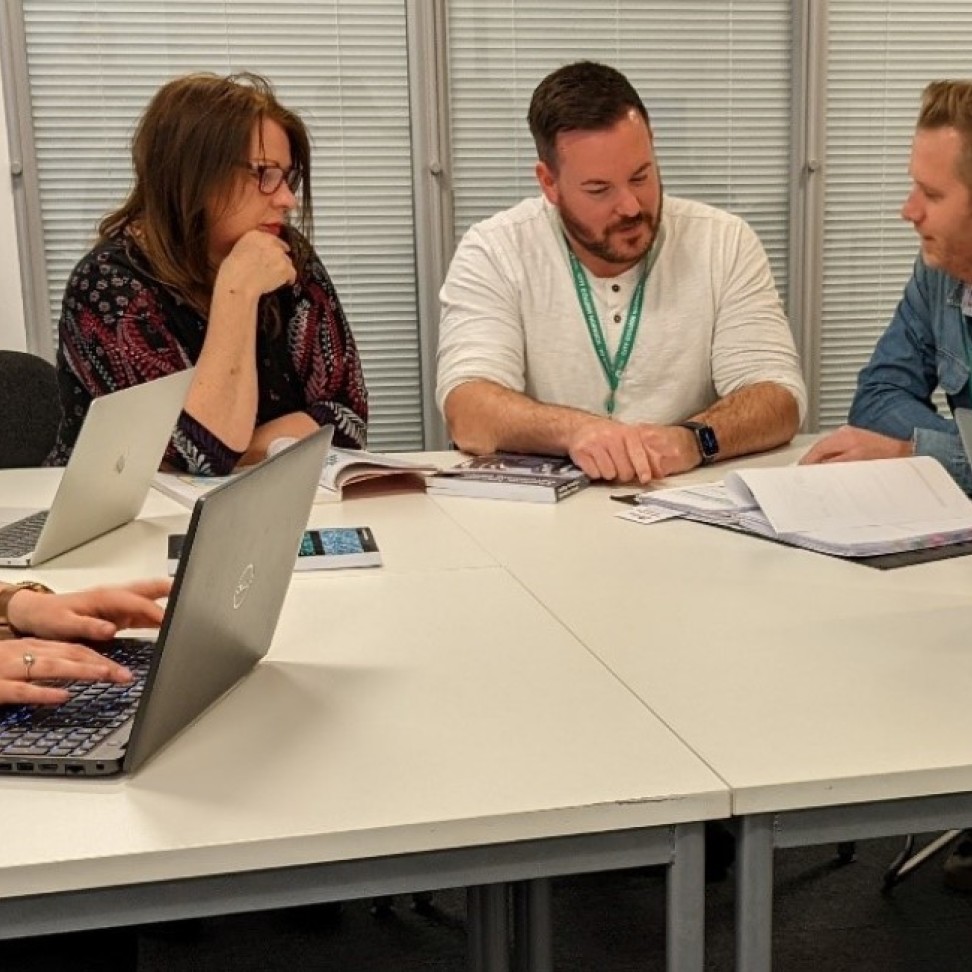 HE students in a group discussion